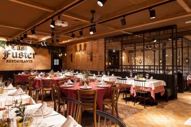 Restaurante com projetores orientáveis de calha trifásica