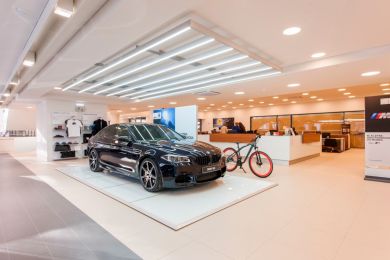 Car dealership with Tromilux brand ceiling lighting Car stand with Tromilux lighting