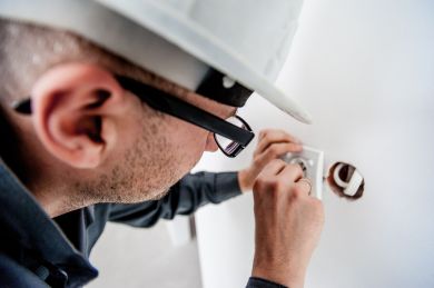 Professional electrician at work Professional electrician at work