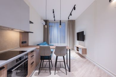 Petit appartement avec cuisine et salon à aire ouverte Petit appartement avec cuisine et salon à aire ouverte